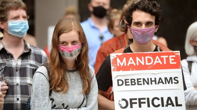 Seán Powney and Cara Daniel joined Debenhams staff and supporters protesting outside Debenhams store on Henry Street, Dublin. Photograph: Dara Mac Dónaill