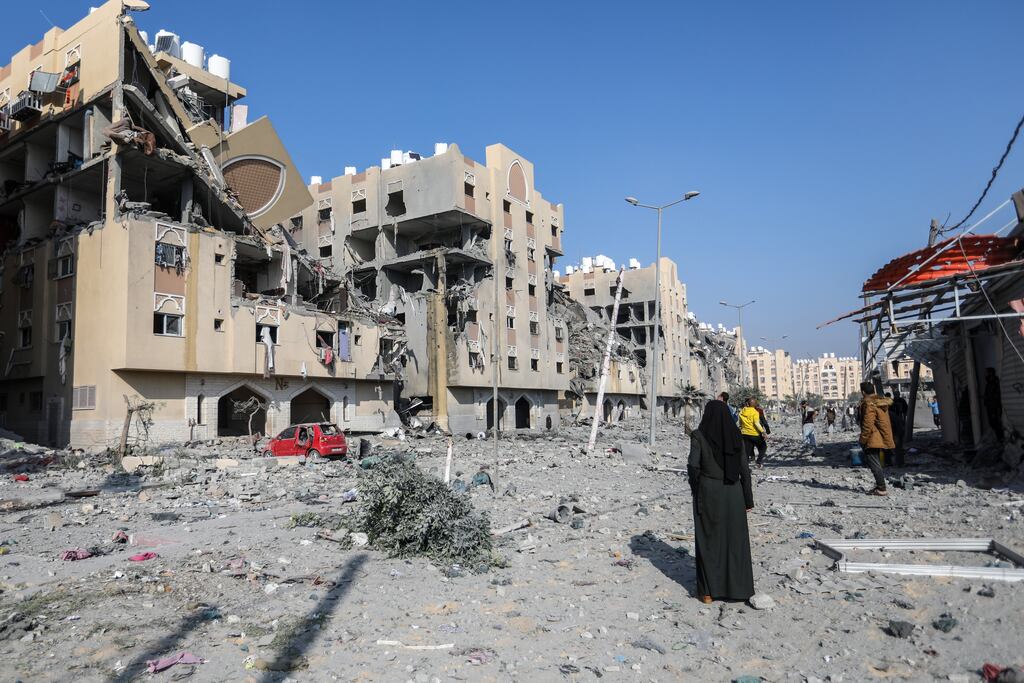 Palestinian citizens inspect the destruction caused by air strikes on their homes in the city of Khan Yunis in Gaza on Saturday. Photograph: Ahmad Hasaballah/Getty Images
