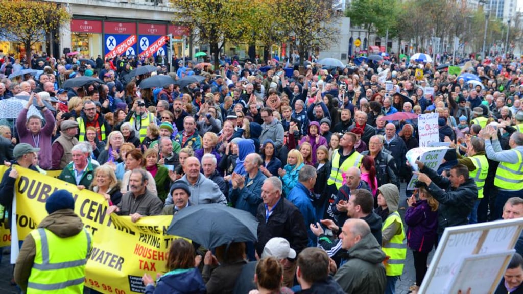 A protest against water charges in Dublin last month. Economist Jim Power warned on Tuesday that the only chance the current government has of getting back into power is another year of economic growth to facilitate a give away Budget next October. Photograph: Cyril Byrne / THE IRISH TIMES