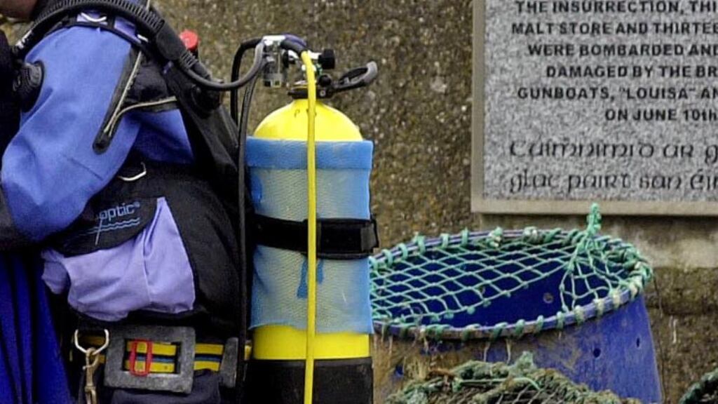 Two firemen, wearing swift-water rescue equipment have rescued a man from the Shannon river. Photograph: Eric Luke/The Irish Times