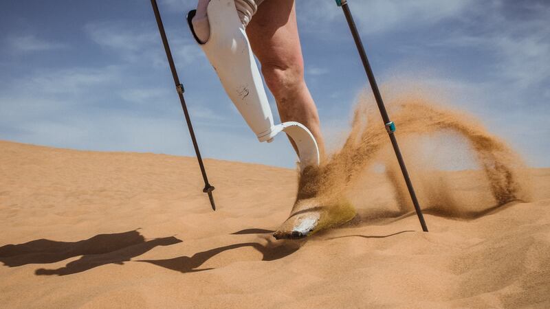 Amy Palmiero-Winters navigates a sand dune during day three.