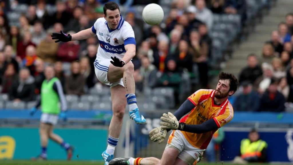 Castlebar goalkeeper Ciaran Naughton saves from Ciaran Dorney of St Vincent’s during the AIB All-Ireland Senior Club Football Final at Croke Park. Photograph: Donall Farmer/Inpho