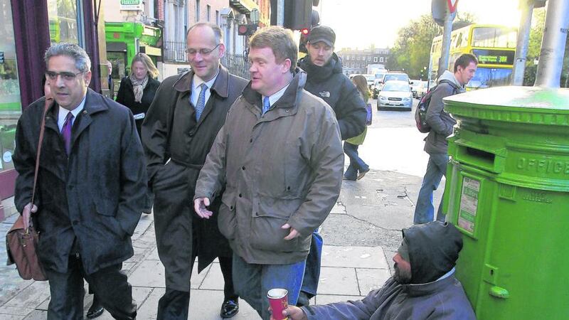 Ajai Chopra of the IMF, left, on his way to the Central Bank in November 2010. Photograph: AP