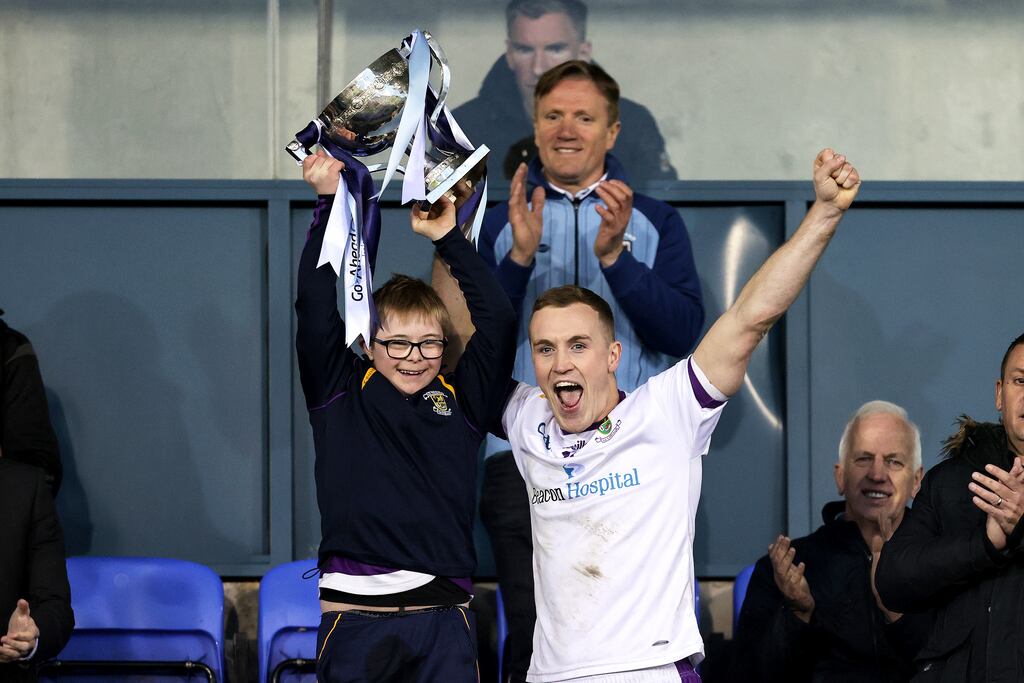 Kilmacud Crokes captain Shane Cunningham lifts the trophy at Parnell Park after the club retained their Dublin SFC title. `The Kilcoo defeat was absolutely heartbreaking. It took a while to get over, a bit of soul searching.' Photograph: Laszlo Geczo/Inpho