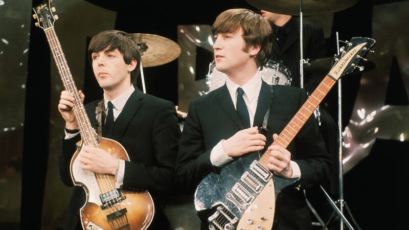 Paul McCartney (left) and John Lennon