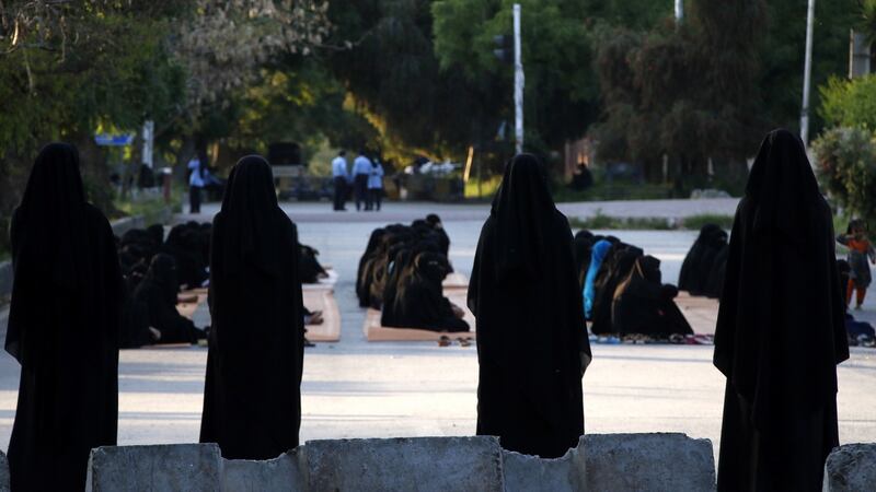 Students at an Islamic seminary gather outside the Lal Masjid (Red Mosque) in Islamabad, Pakistan, on Tuesday. Photograph: Sohail Shahzad/EPA