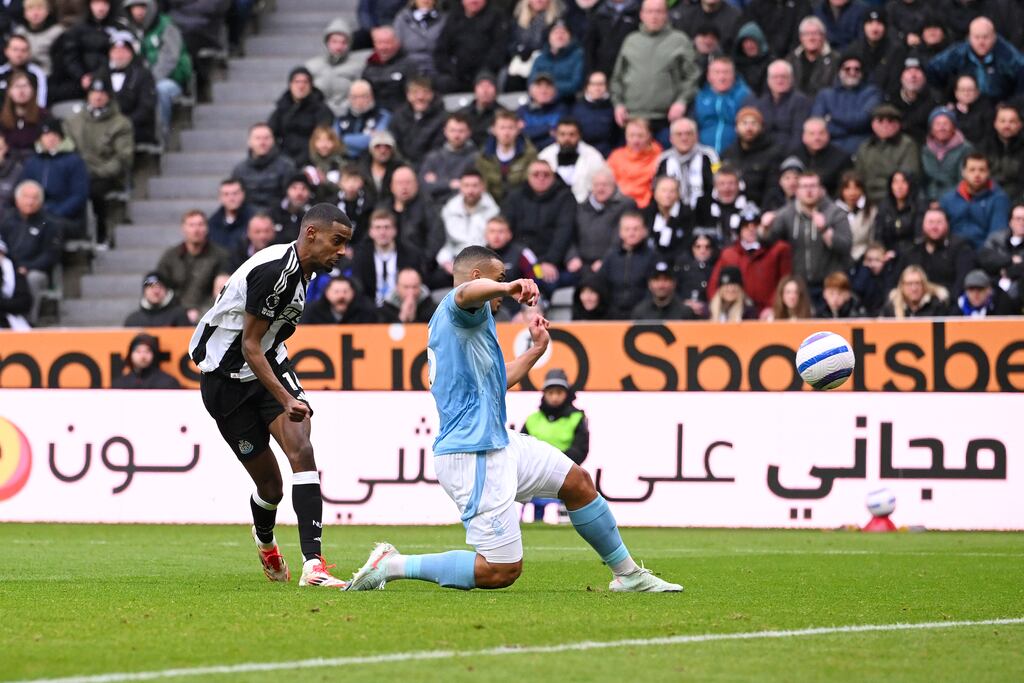 Alexander Isak of Newcastle United scores his team's fourth goal. Photograph: Stu Forster/Getty