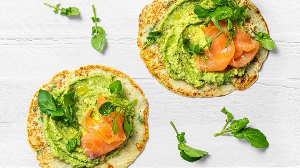 Potato pancake with smashed avocado and smoked salmon.