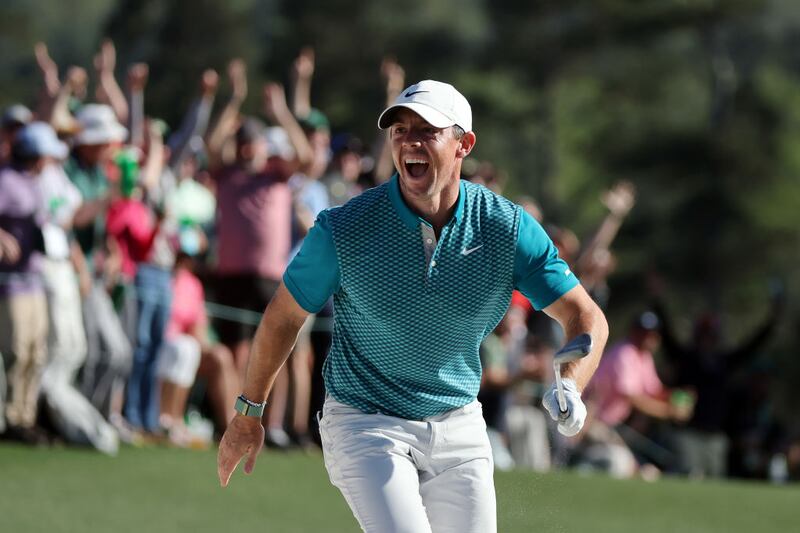 Rory McIlroy reacts after chipping in for birdie from the bunker on the 18th green during the final round of the Masters at Augusta National Golf Club last year. Photograph: Gregory Shamus/Getty Images