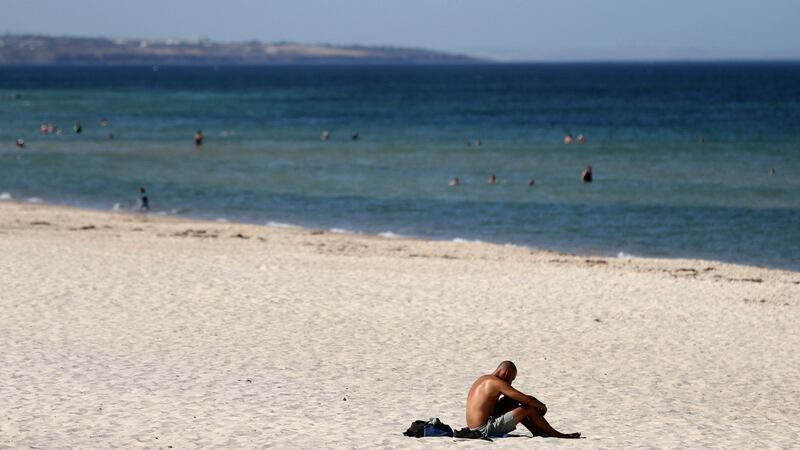 Adelaide sweltered through the highest temperature ever recorded by a major Australian city on Thursday, peaking at a searing 46.6 degrees as the drought-parched nation heads toward potentially the hottest January on record. Photograph: Kelly Barnes/AAP Image via AP