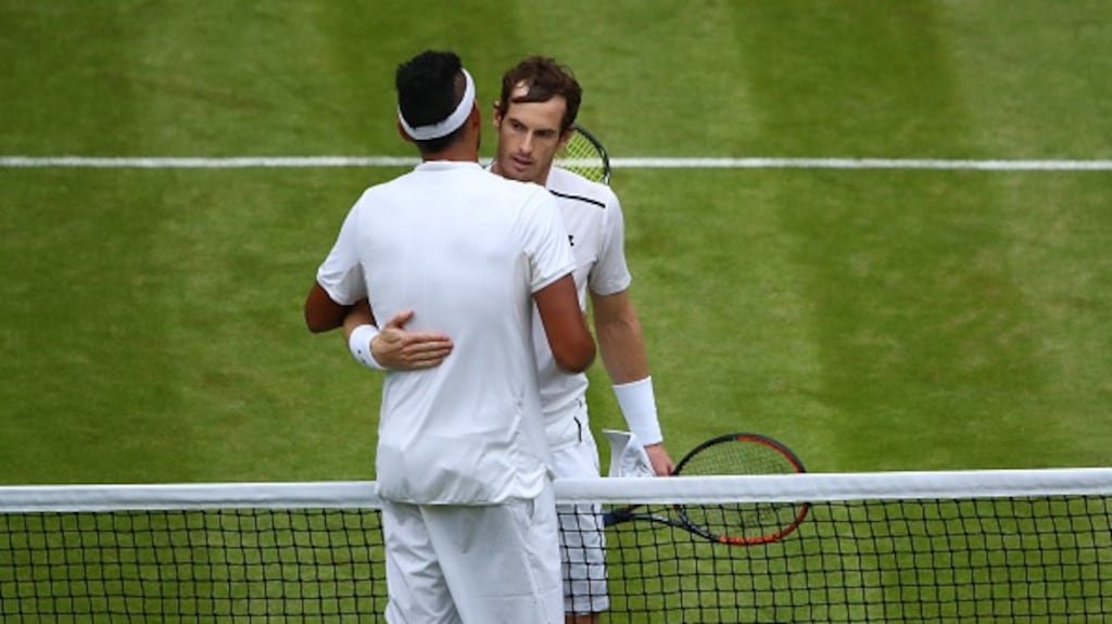 Nick Kyrgios looks up to world number one Andy Murray. Photograph: Getty