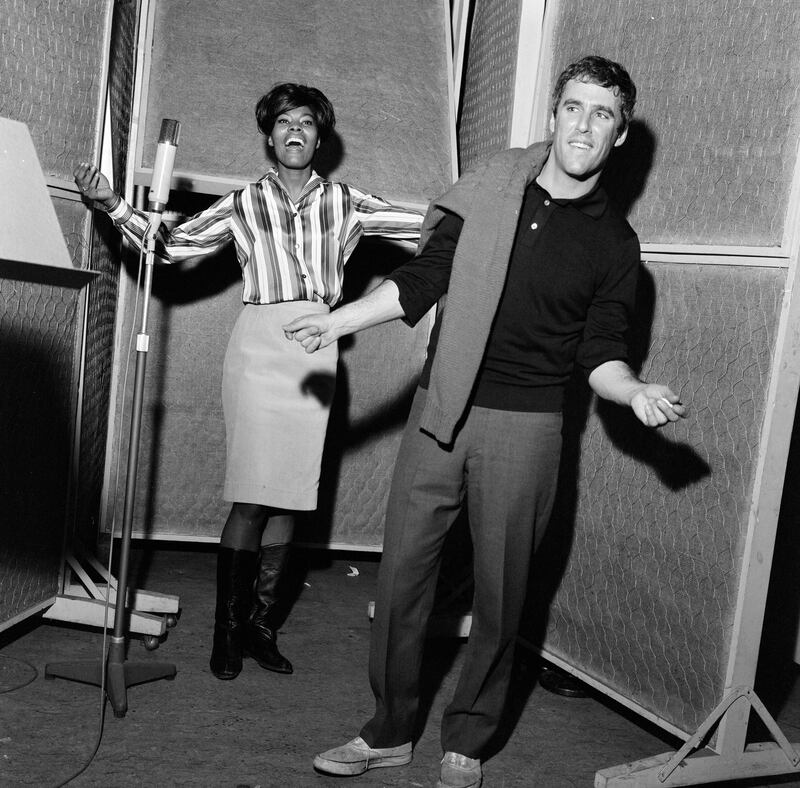 Partnership: Burt Bacharach with Dionne Warwick at the Pye studios in London in 1964. Photograph: Daily Mirror via Getty