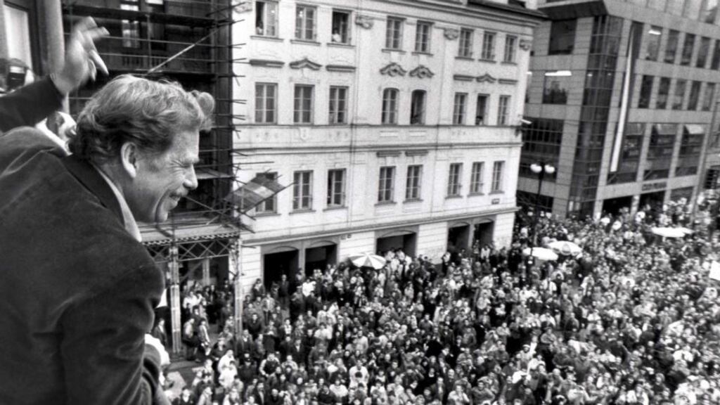 Presidential candidate Vaclav Havel waves to his supporters from a balcony in Prague in 1989. Photograph: Petar Kujundzic / Reuters