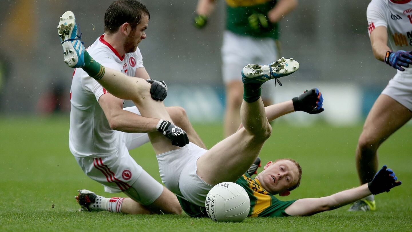 Tyrone’s Ronan McNamee challenges Kerry’s Colm Cooper in the 2015 All-Ireland semi-final. Photograph: Donall Farmer/Inpho