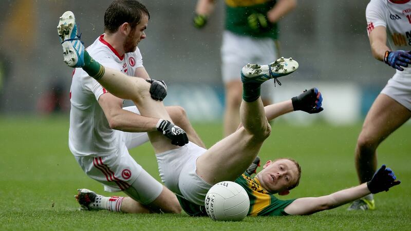 Tyrone’s Ronan McNamee challenges Kerry’s Colm Cooper in the 2015 All-Ireland semi-final. Photograph: Donall Farmer/Inpho