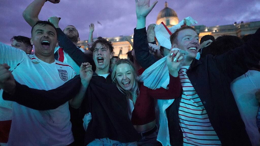 England fans celebrate in Trafalgar Square one of their team’s wins on the way to this weekend’s final in July this year. Photograph: Victoria Jones / PA Wire.