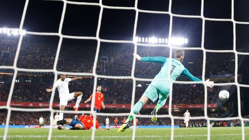 Marcus Rashford scores in the first half. Photograph: Carl Recine/Reuters