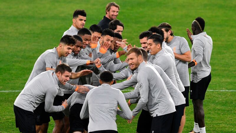 Liverpool’s players take part in a training session at Ramón Sánchez Pizjuán stadium in Seville on the eve of the UEFA Champions League group E match between Sevilla and Liverpool. Photograph: Cristina Quicler/AFP/Getty Images