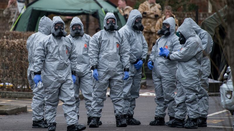 Military personnel wearing protective suits continue investigations into the poisoning of Sergei Skripal in Salisbury, England. Photograph: Chris J Ratcliffe/Getty Images