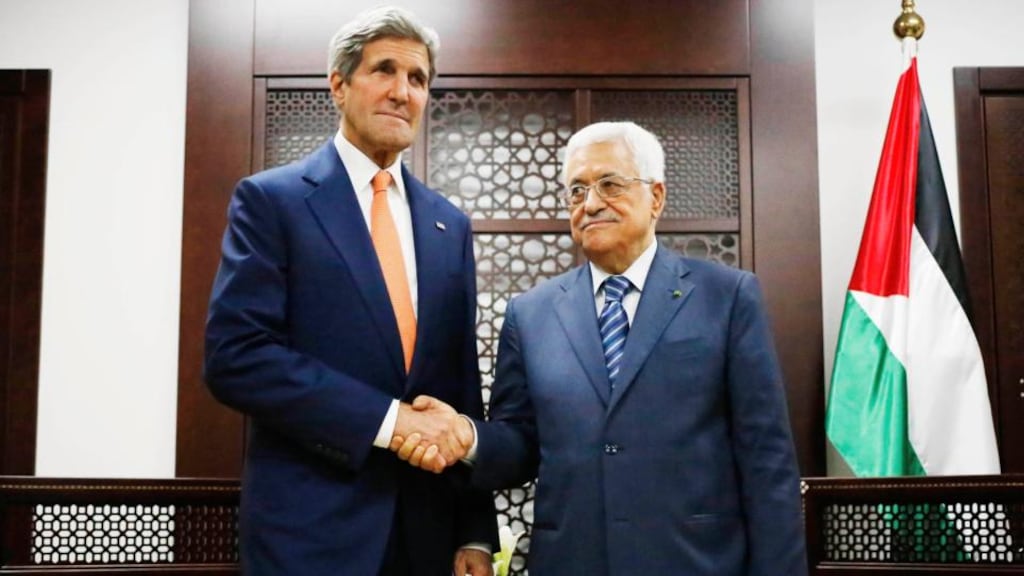 US Secretary of State John Kerry meets Palestinian Authority President Mahmoud Abbas in Ramallah. Israeli forces pounded Gaza on Wednesday, meeting stiff resistance from Hamas Islamists and sending thousands of residents fleeing, as US Secretary of State John Kerry said on a visit to Israel ceasefire talks had made some progress. Photograph: Charles Dharapak/Reuters
