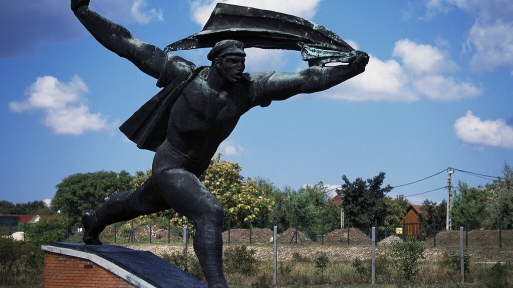The Republic of Councils Monument (1969), by Istvan Kiss, at Memento Park, Budapest: the park is an intriguingly elegant place to which the plaques and monuments to the icons of the Communist period have been exiled. Photograph: DeAgostini/Getty Images