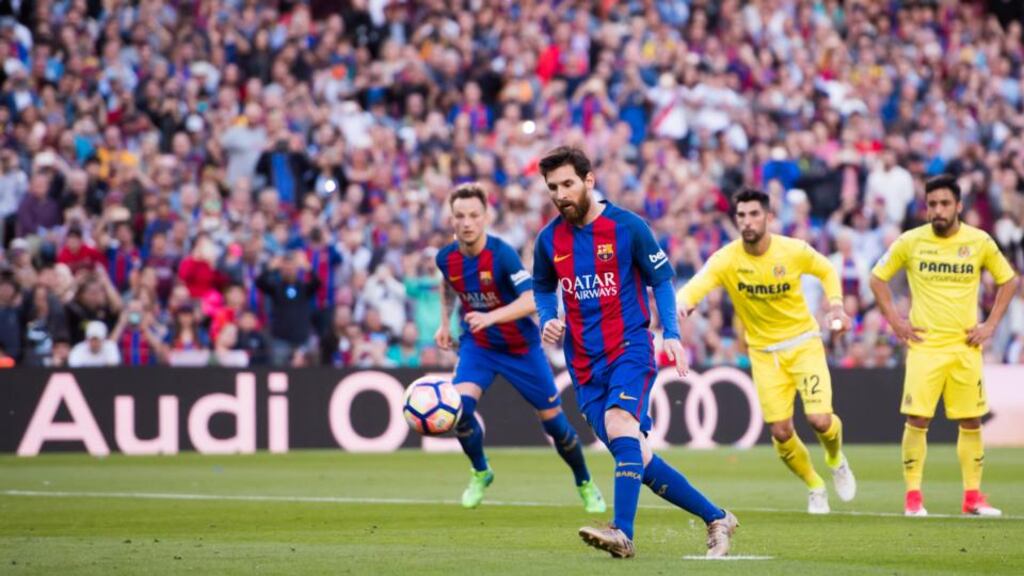 Lionel Messi of FC Barcelona scores a penalty in their La Liga win over Villareal. Photo: Alex Caparros/Getty Images