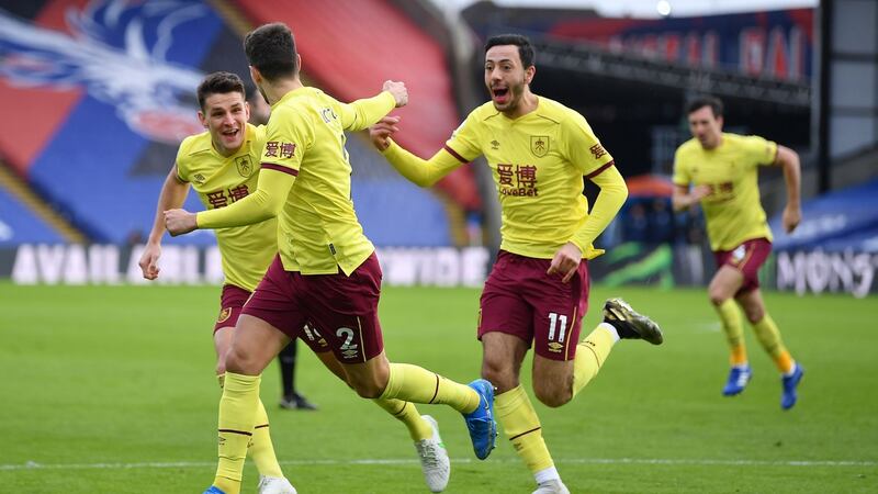 Burnley’s Matt Lowton celebrates with teammates after scoring his team’s third goal during the Premier League win over Crystal Palace at Selhurst Park. Photo: Justin Setterfield/POOL/AFP via Getty Images