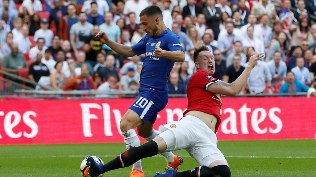 Manchester United’s Phil Jones concedes a first half penalty. Photograph: Andrew Yates/Reuters