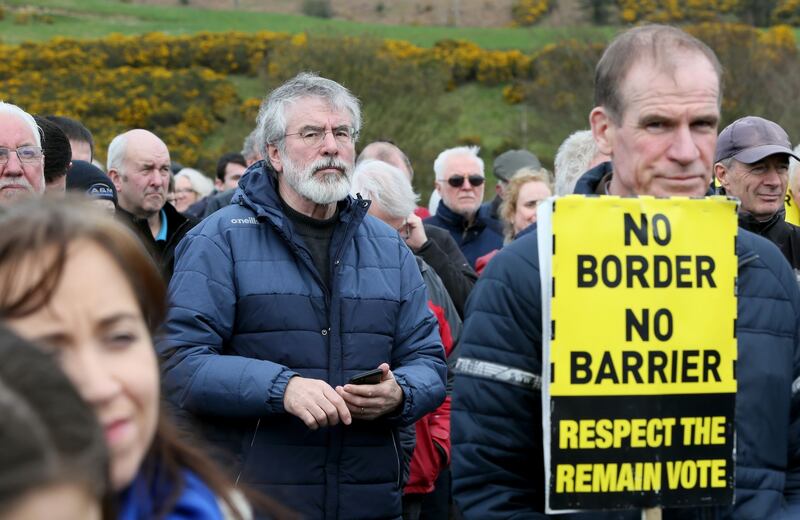 Former Sinn Féin president Gerry Adams joins protesters at Carrickcarnan on Saturday. Photograph: Paul Faith/AFP/Getty