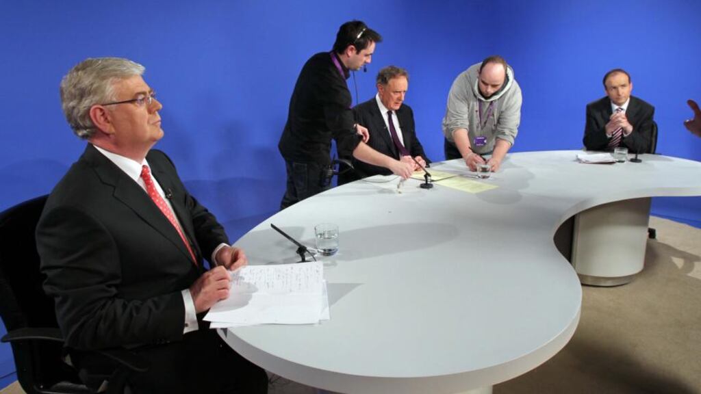Eamon Gilmore and Micheál Martin prepare for the first televised leaders’ debate of the 2011 general election, hosted by Vincent Browne on TV3. “Commercial broadcasters also deliver a public service.” Photograph: Colin Keegan/Collins