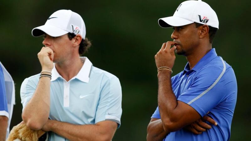 Northern Ireland’s Rory McIlroy (left) and Tiger Woods of the US stand together on the second green during the first round of the 2013 US Open golf championship at the Merion Golf Club in Ardmore, Pennsylvania yesterday.Photograph: Matt Sullivan/Reuters