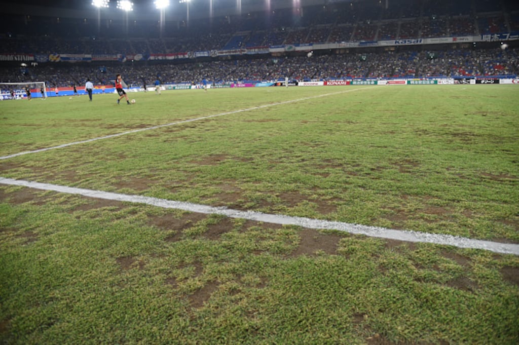 The pitch at Nissan Stadium was in a sorry state when it hosted a recent match in Japan’s top-tier football competition. Photograph: Getty Images