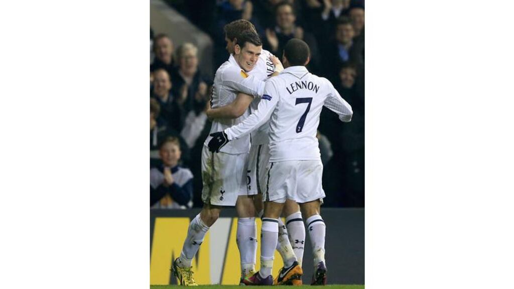 Gareth Bale celebrates with goal scorer Jan Vertonghen Tottenham's third goal against Inter Milan. Photograph: Richard Heathcote/Getty Images