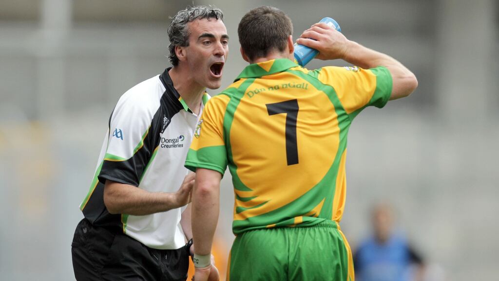 Donegal Manager Jim McGuinness speaks to Kevin Cassidy during the All-Ireland quarter-final in 2011. Photo: Morgan Treacy/Inpho