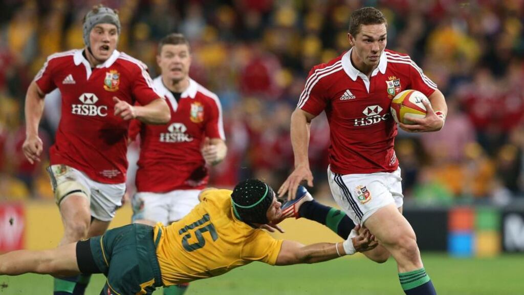 George North goes past Australia fullback Berrick Barnes to score a try during the first Test at Suncorp Stadium in Brisbane. Photograph: Mark Metcalfe/Getty Images