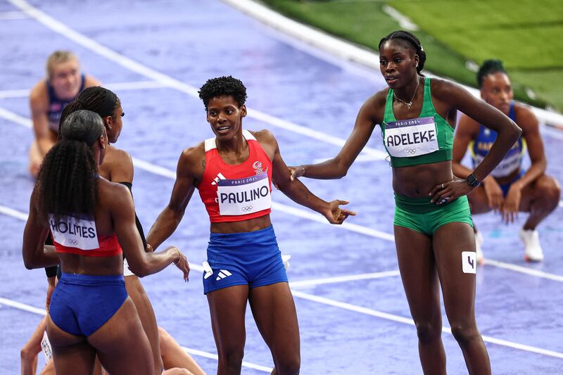 Marileidy Paulino, Alexis Holmes and Rhasidat Adeleke after last year's Olympic 400m final in Paris. Adeleke finished fourth. Photograph: Anne-Christine Poujoulat/AFP via Getty Images