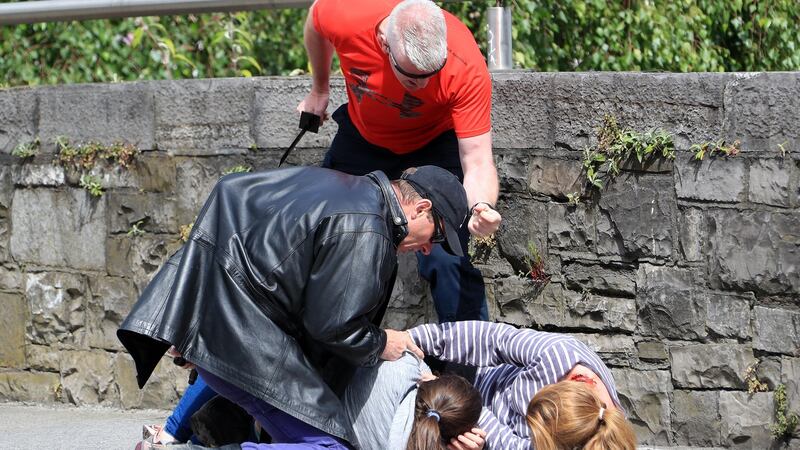 “Terrorists” attack two women during a simulated terrorist attack in Dublin. Photograph: Collins