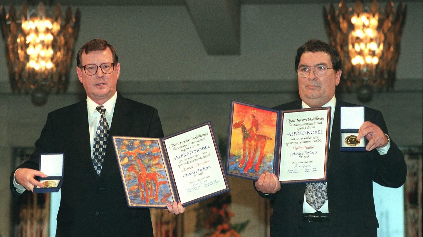 Nobel Peace Prize winners David Trimble and John Hume MEP display the Alfred Nobel medals and diplomas at the presentation ceremony in Oslo City Hall in 1998. Photograph: Matt Kavanagh