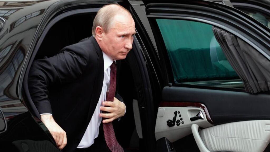 President Vladimir Putin today asked Russia’s upper house to revoke the right it had granted him to order a military intervention in Ukraine in defence of Russian-speakers there. Photograph: Heinz-Peter Bader/Reuters.