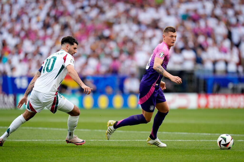 Germany's Toni Kroos in action against Hungary’s Dominik Szoboszlai during the UEFA Euro 2024 Group A match in Stuttgart. Photograph: Nick Potts/PA Wire