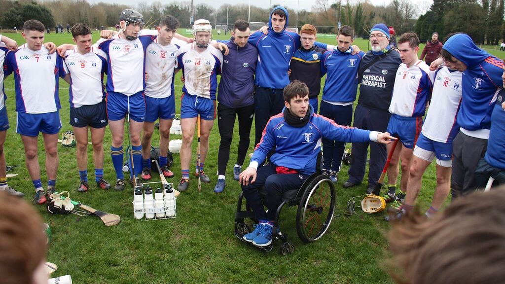 Mary I manager Jamie Wall speaks to his team after winning the Fitzgibbon Cup on Saturday. Photograph: Mike Shaughnessy/Inpho