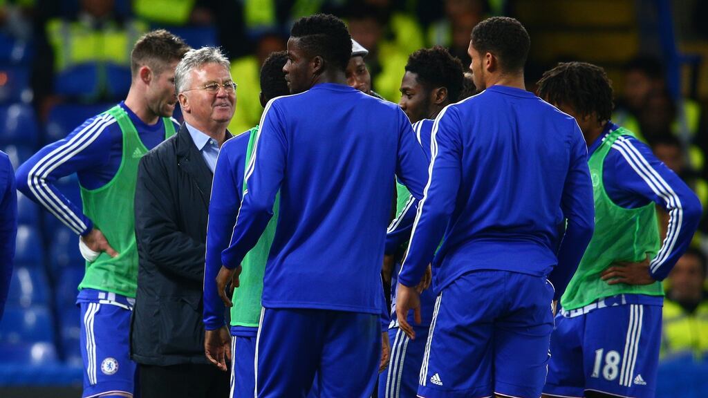 Chelsea interim manager Guus Hiddink congratulates players after their 3-1 win against Sunderland in the Premier League. Photo: Clive Mason/Getty Images