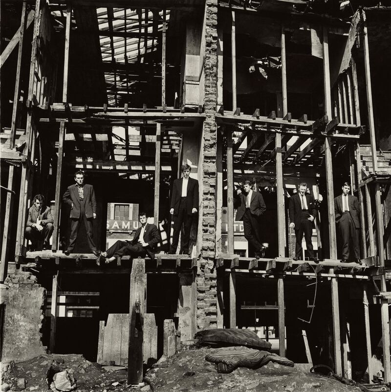 Don McCullin, The Guvnors (1958) –  wannabe gangsters pose in  a bombed out house. Credit: Don McCullin/Tate