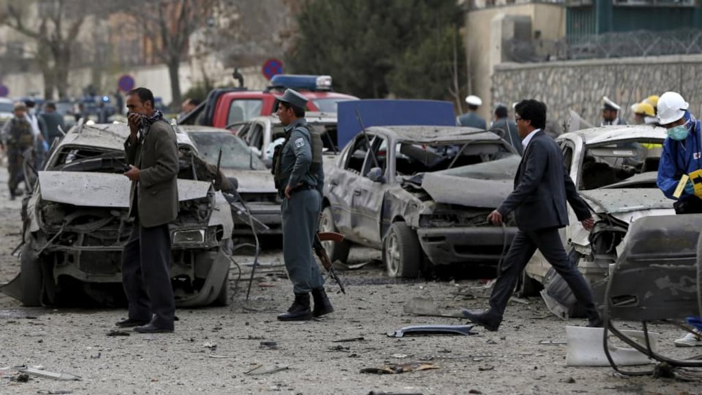 Afghan security forces at the site of a suicide attack in Kabul on Wednesday. Six people were killed and more than 30 injured in the bombing close to the presidential palace. Photograph: Omar Sobhani/Reuters
