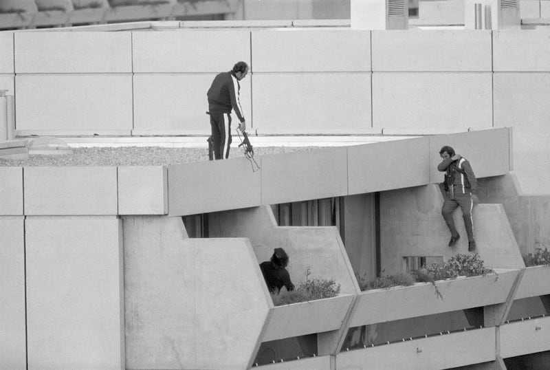 Armed police drop into position on a terrace directly above the apartment where Israeli athletes were held by Palestinian militants during the 1972 Olympics in Munich. Photograph: Bettman archive