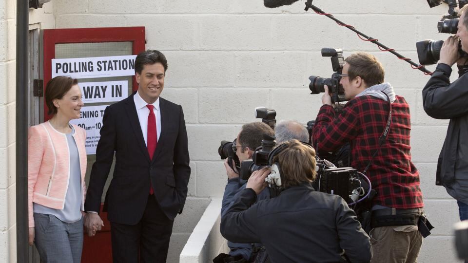 Ed Miliband and his wife Justine Thornton leave after casting their votes in the village of Sutton, near Doncaster, in northern England. Photograph: Oli Scarff/AFP/Getty Images