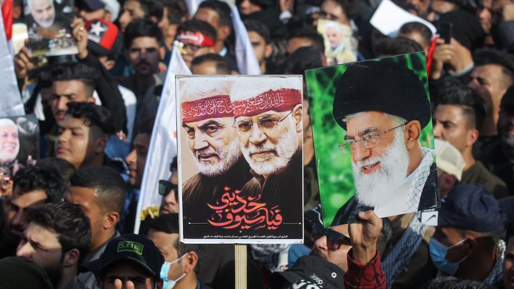 Iraqi demonstrators gather to mark the anniversary of the US killing of Iranian general Qassem Soleimani and an Iraqi militia commander, in  Tahrir square in the capital Baghdad. Photograph:  ahmad Al-Rubaye/AFP