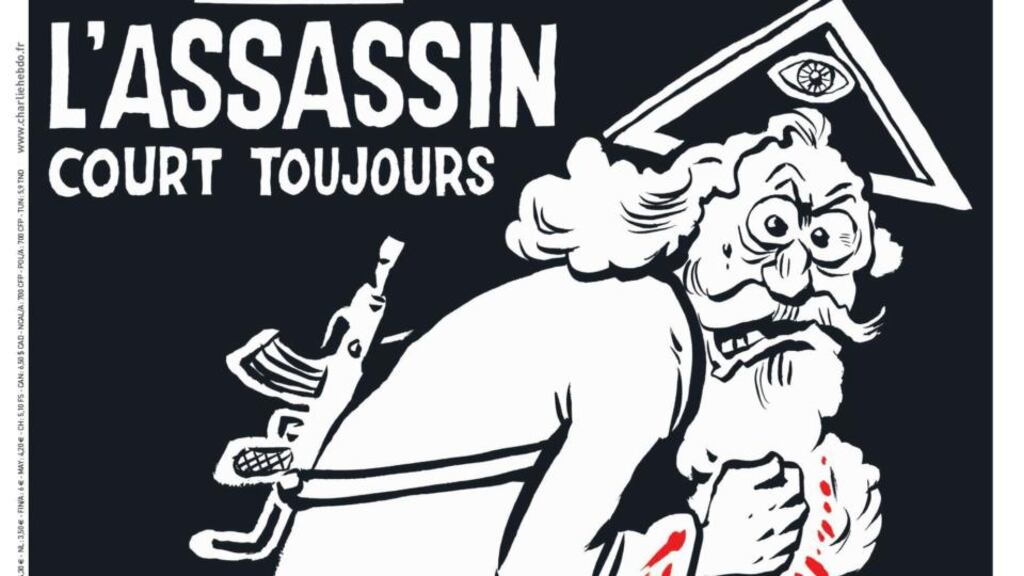 The cover of the special issue #1224 of the French satirical weekly Charlie Hebdo with a cartoon of a bearded god carrying a kalashnikov reading ‘1 an apres. L’assassin court toujours’ (lit: One year later.The murderer is still on the run). Image: Charlie Hebdo/Majorelle PR Handout/EPA.