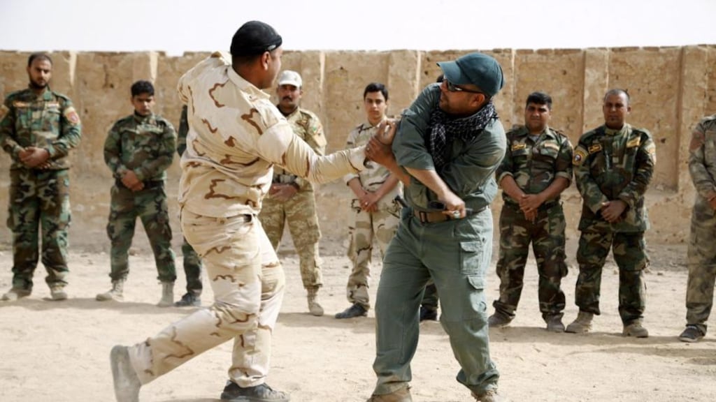 Shia volunteers receive martial arts training at a military base in Najaf, in southern Iraq. Shia volunteers have been assisiting the Iraqi army as it battles fighters from Islamic State, recently fighting off a major offensive the vicinity of the Ain al-Asad airbase. Photograph: EPA