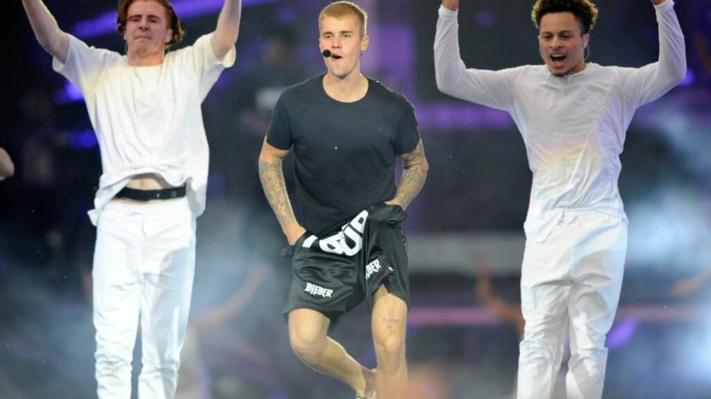 ‘Justin Bieber stands, hands firmly placed on the crotch of his shorts, looking like a bored dudebro waiting for his Ryanair flight to Magaluf.’ Photograph: Dave Meehan